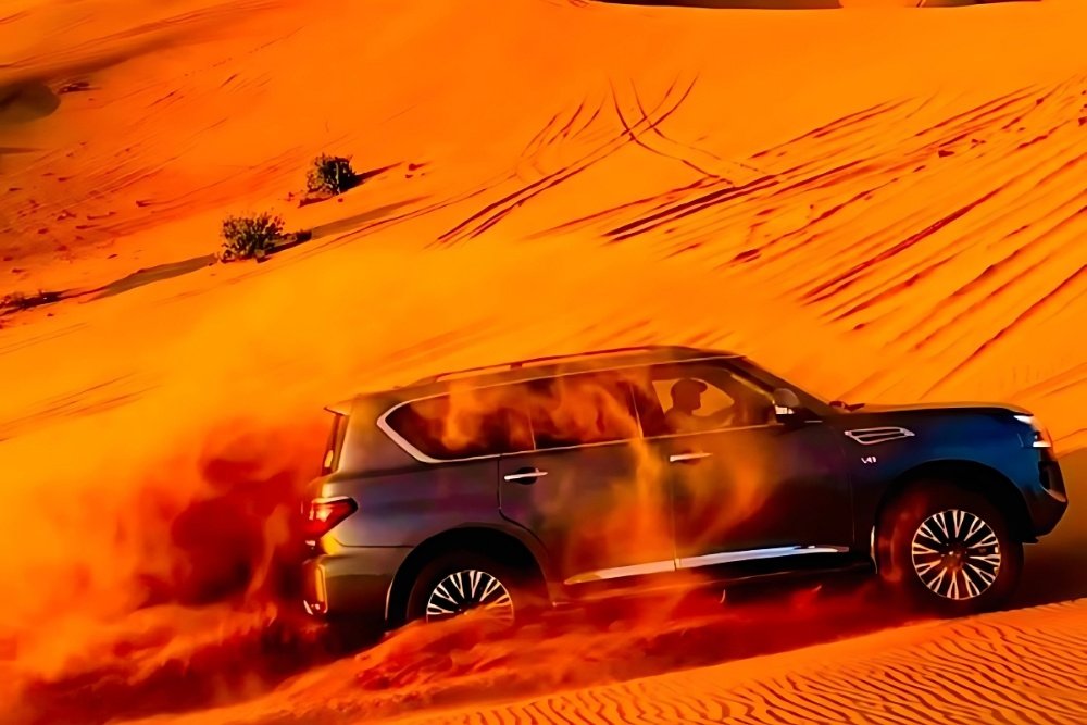 DDV 4×4 convoy crossing Dubai’s golden desert dunes