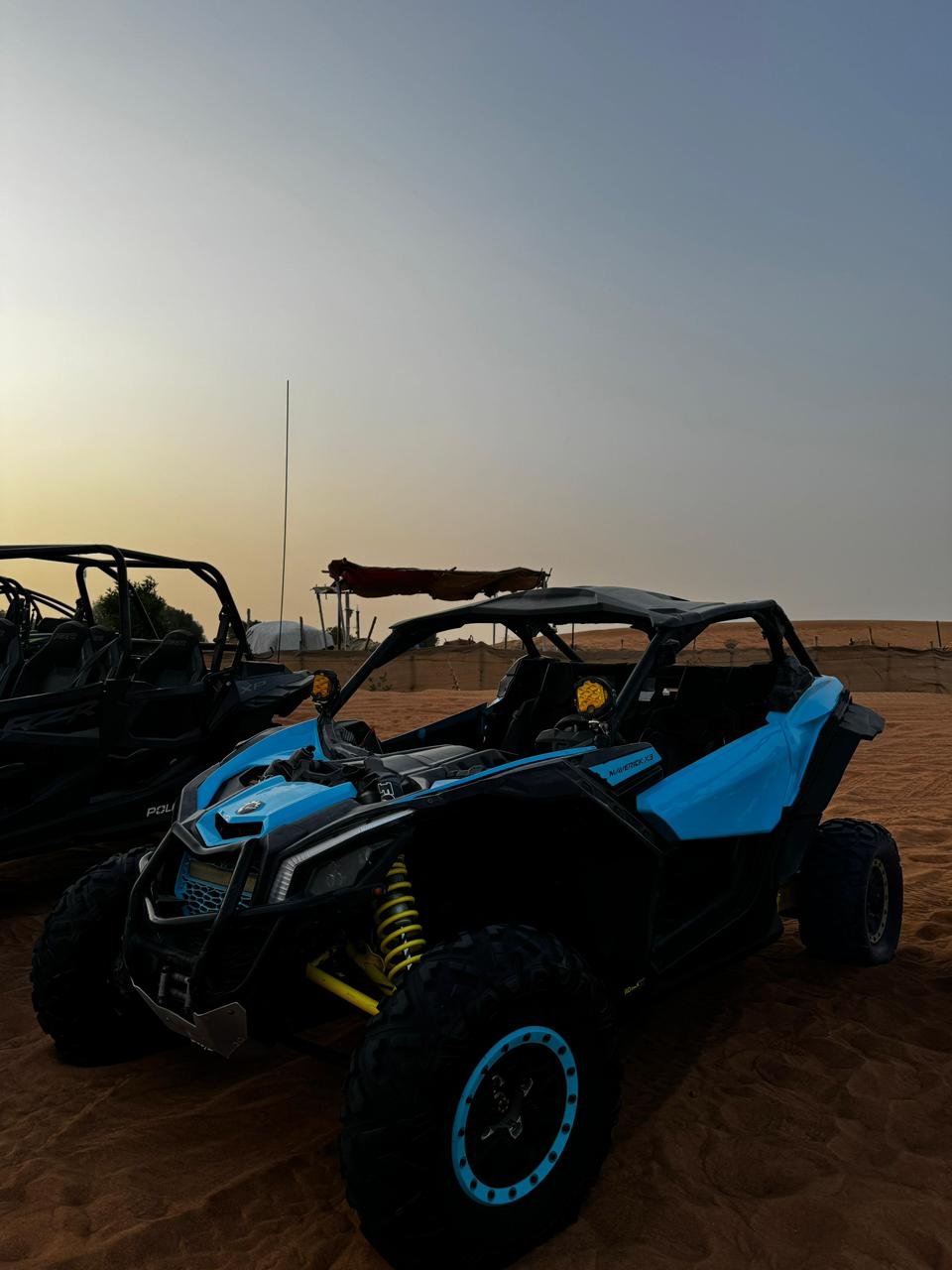 Can-Am 1000cc buggy parked atop a dune in Dubai